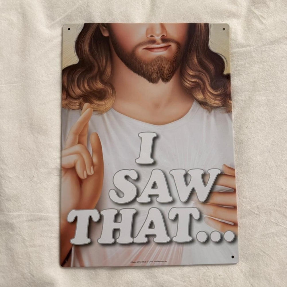 Aluminum wall art featuring the iconic "I saw that" meme